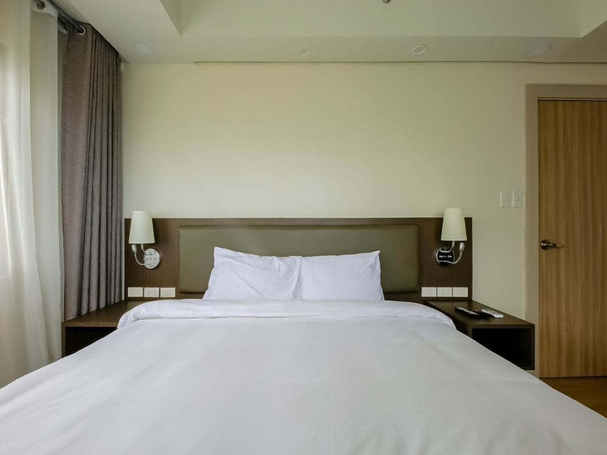 Capital O 804 The Residences At Bonifacio Civic Center Manila Exterior photo